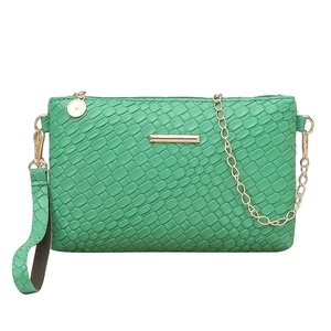 Green embossed snakeskin texture crossbody bag with gold chain strap and wristlet