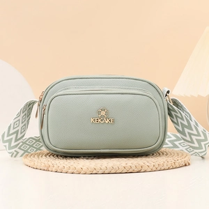 Chic bean green crossbody bag with double zip design and geometric wide strap