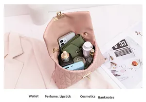 Pink quilted crossbody bag interior capacity showing phone, wallet and cosmetics