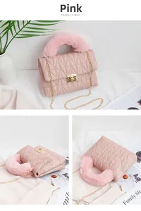 Detail of pink quilted crossbody bag with gold lock and plush faux fur handle