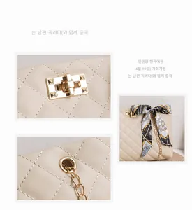 Close-up of quilted cream leather bag with gold twist lock and patterned silk scarf