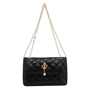 Classic black quilted chain shoulder bag with gold crown clasp and pearl pendant