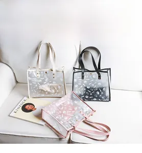 Detailed view of three PVC tote bags with makeup prints on a white sofa with magazine