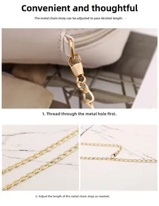 Close-up of adjustable gold chain strap on white leather handbag showing link details