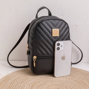 Mini black quilted PU leather backpack for women with gold zippers and size reference phone