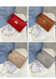 Quilted crossbody bags with leaf lock and gold chains in red, brown, beige, and grey colors