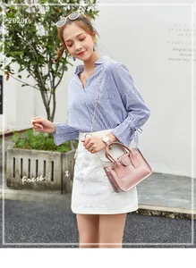 Pink transparent PVC bucket bag with chain strap and inner pouch shown on a model