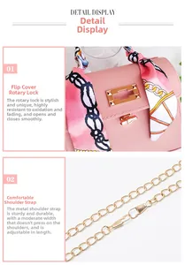 Detail view of pink leather handbag showing swivel lock and silk scarf wrapped handle