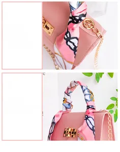 Detail of pink crossbody bag showing floral scarf handle and gold chain strap