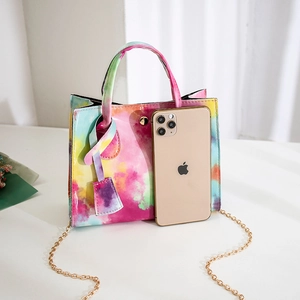 Rainbow tie-dye mini handbag in glossy patent leather with gold chain and phone for size