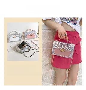 Detailed view of laser colorful mini crossbody bags with metallic twist lock in three colors