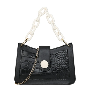 Black crocodile embossed hobo bag with white acrylic chain handle and gold metallic chain