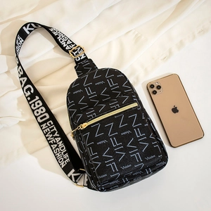 Black leather crossbody chest bag with white letter print and gold zipper detail