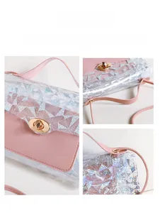Detailed view of pink holographic crossbody bag with gold hardware and laser textures