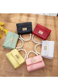 Mini jelly bags in six vibrant colors with crocodile pattern and pearl handles