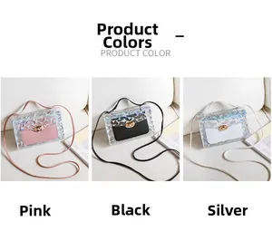 Detail view of mini transparent crossbody bags in pink, black, and silver finishes
