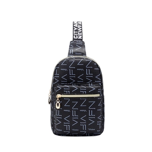 Black leather crossbody chest bag with blue monogram print and gold zipper detail