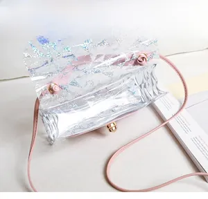 Detail view of the spacious main compartment in a transparent laser crossbody bag