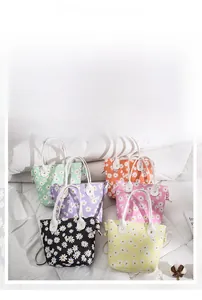 Detailed close-up of six daisy pattern bucket bags in various pastel colors with round handles