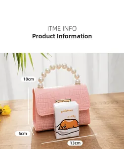 Detailed view of pink croc-embossed jelly bag with pearl handle and size dimensions