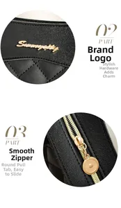 Close-up of golden Sunnycity logo, quilted leather texture, and smooth zipper detail
