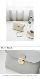 Detail of a cream crossgrain leather mini crossbody bag with a gold push-lock closure