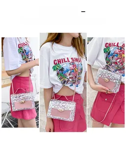 Three-way style showing the holographic silver mini crossbody bag worn as a handbag and shoulder bag