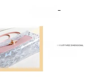 Detail of transparent crossbody bag with pink leather flap and geometric prism texture