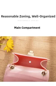 Inside view of pink crocodile pattern jelly bag with spacious main pocket and gold clasp