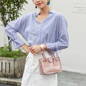 Pink transparent PVC jelly handbag with leather inner pouch and gold chain strap