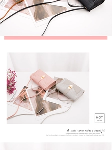 Mini faux crocodile leather bags in pink, grey, and black with elegant gold clasps