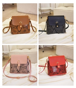 Detail showing snake print crossbody bags in brown, black, pink, and red with metal lock