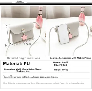 Detailed size view of grey PU leather crossbody bag with star charm and measurements