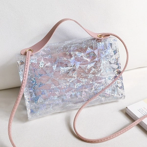 Transparent geometric crossbody bag with glitter finish and pink leather strap