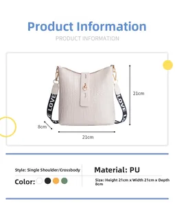 Detail view of white crocodile pattern bucket bag showing product dimensions and PU leather