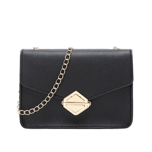Modern black chain crossbody mini bag with gold geometric clasp and leather texture