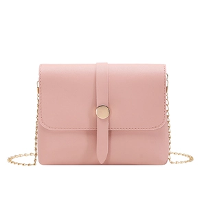 Pale pink minimalist chain crossbody bag with golden round buckle and textured finish