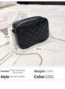 Detail view of black quilted camera bag showing 19x14x6.5cm dimensions and gold chain