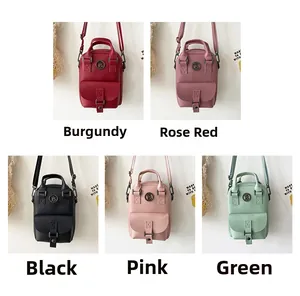 Mini crossbody bags displayed in burgundy, rose, black, pink and green with metal B logo