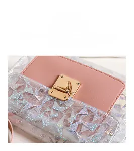 Close-up of pink leather flap and iridescent geometric texture on transparent bag