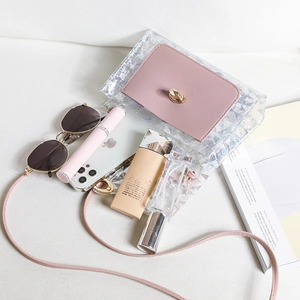 Transparent laser PVC crossbody bag with pink leather flap and metallic clasp