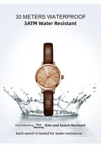 Detail of GEDI small round quartz watch with leather strap showing 3ATM water resistance