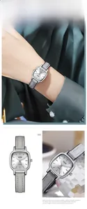 Detailed macro view of GEDI quartz watch featuring silver sunray dial and grey leather strap