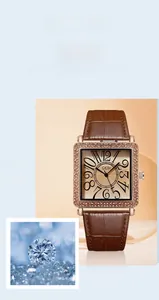 Detailed macro view of a rose gold square watch face with sparkling crystal bezel and GEDI logo