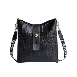 Black crocodile embossed bucket bag with gold circular lock and LOVE letter strap