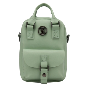 Stylish mint green mini backpack with TB metal logo and front magnetic flap pocket