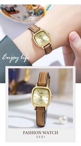 Close-up of GEDI square gold watch with brown leather strap and elegant champagne dial