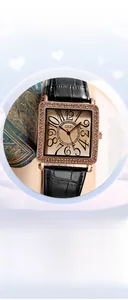 Close-up of vintage square watch dial with diamond-set bezel and sunburst pattern