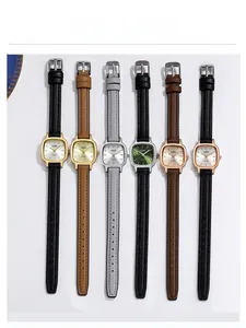 Close-up of GEDI women's quartz watches showing multiple leather strap colors and square dials