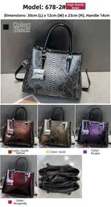 Detail view of snakeskin pattern leather bag with internal multi-layer storage compartments